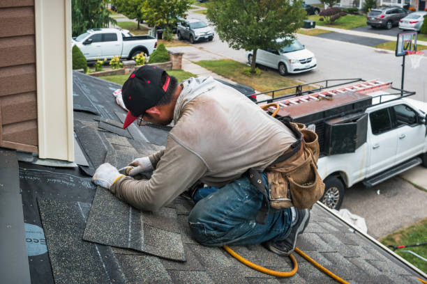Professional Roof Replacement technician working in Smithtown, NY